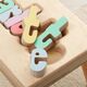 Two Step Name Puzzle Letter Kids Step Stool in Natural Maple Image 2 of 3